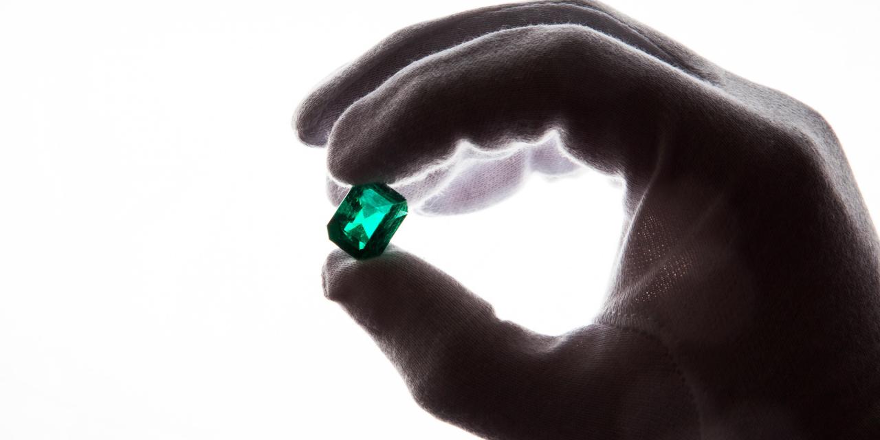 Holding Emerald